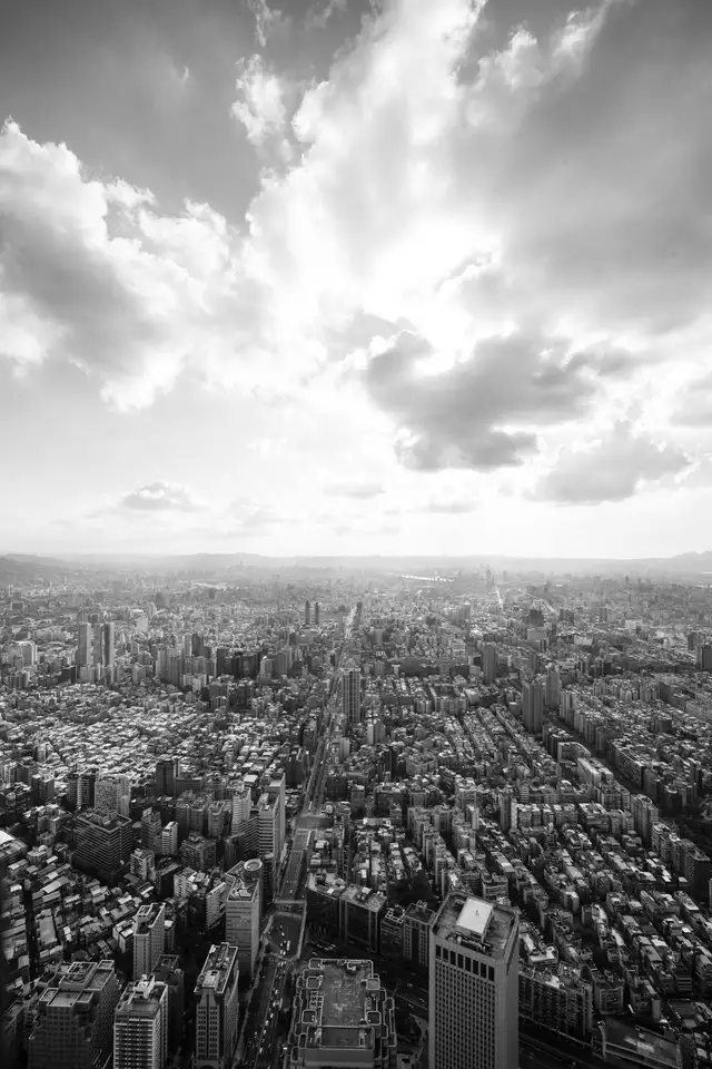A city skyline under a cloudy sky